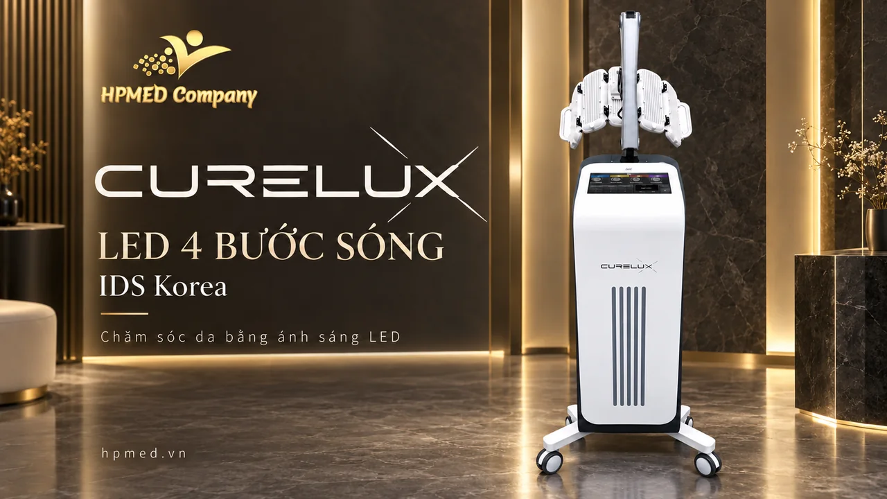 Thiết bị LED CURELUX IDS với thân máy trắng, màn hình điều khiển, tay đỡ và chân đế có bánh xe